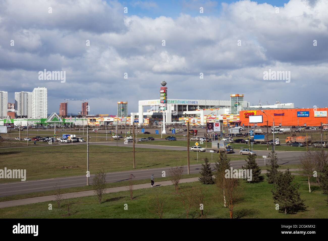 District 'Northern' of the  Krasnoyarsk city overlooking the shopping and entertainment center at the Prospect Aviatorov in the spring. Krasnoyarsk Te Stock Photo
