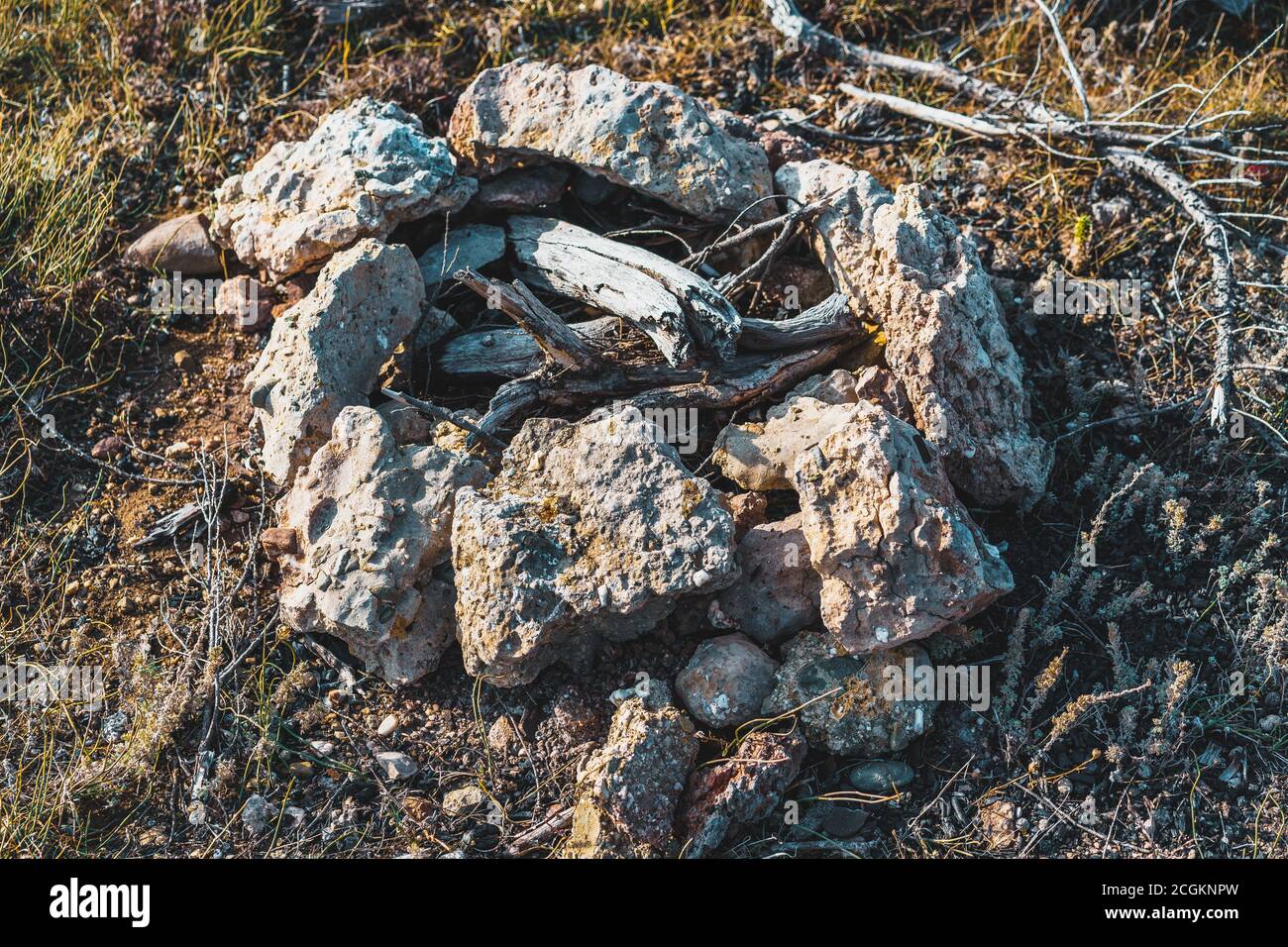 Camp fire rock circle in the mountains Stock Photo