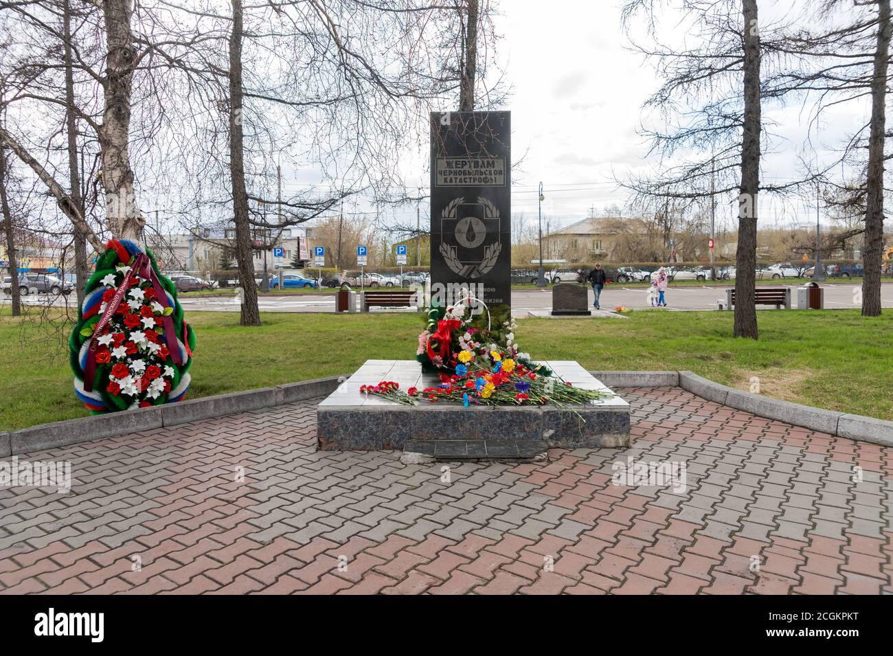 Monument to the victims of the Chernobyl accident and the liquidators of its consequences was opened in 1997 at the Victory Square in Krasnoyarsk. Stock Photo