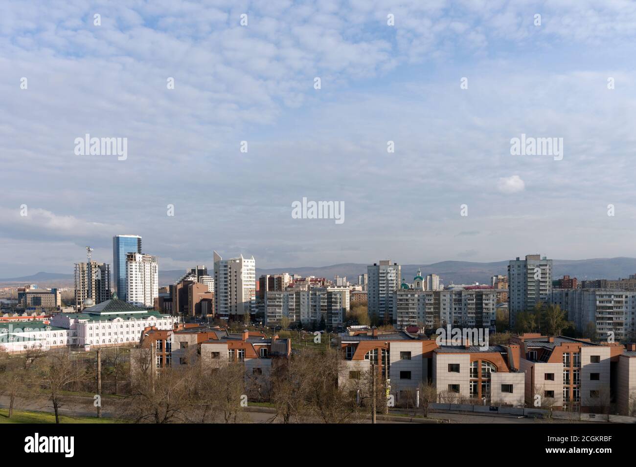 View of the central district of the city of Krasnoyarsk from the hill in the spring afternoon. Stock Photo