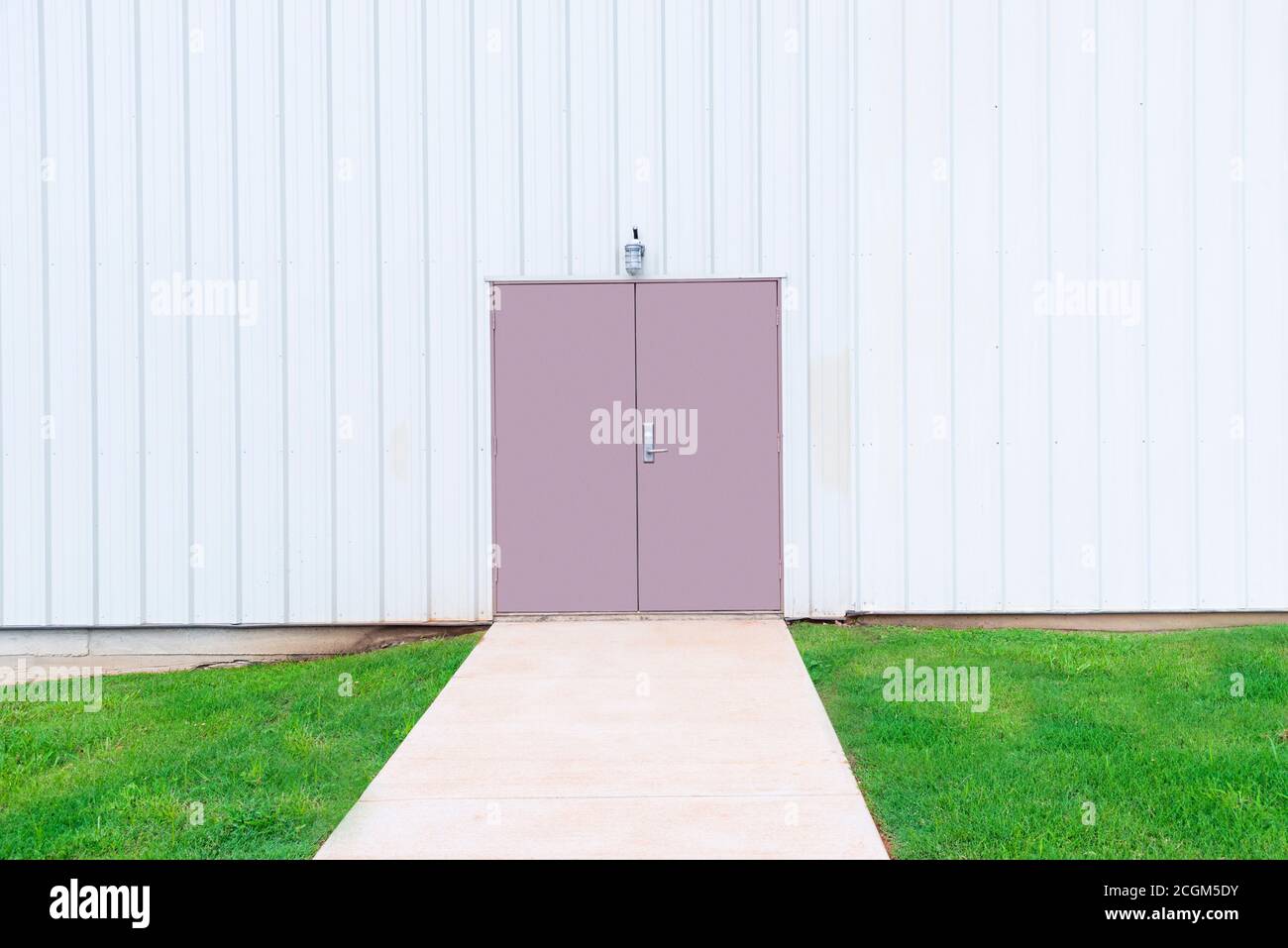 Horizontal shot of a double door in a commercial building with copy space. Stock Photo
