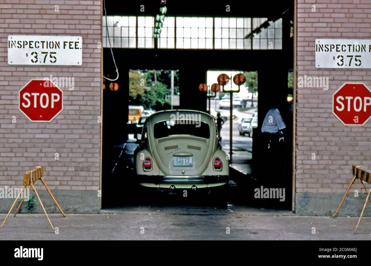 September 1975 Car Has Just Entered the Safety Lane at an Auto Emission Inspection Station in