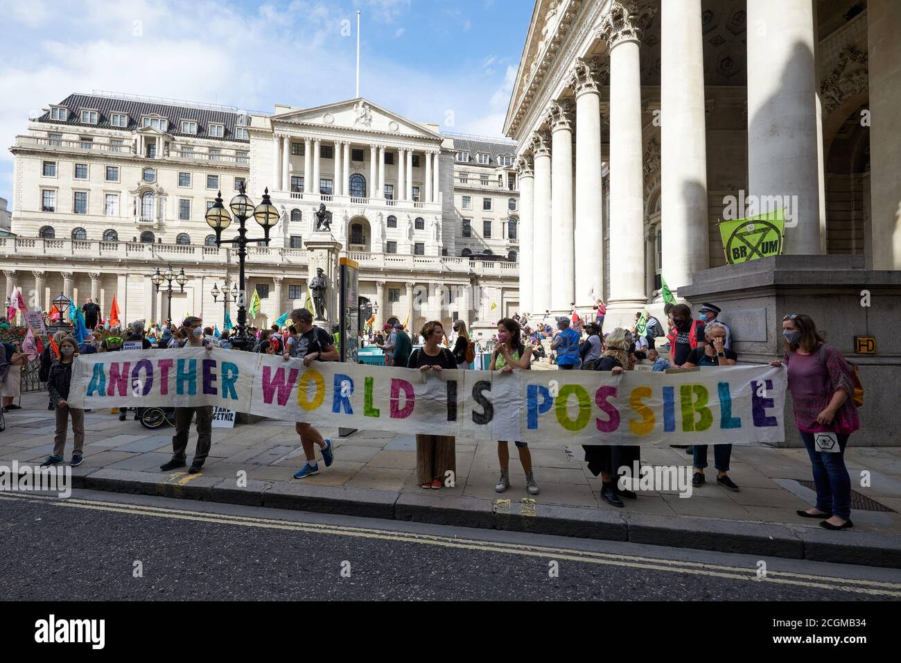 London, UK. - 10 Sept 2020: Supporters of Extinction Rebellion hold a banner outside the Bank of England prior to marching to Parliament Square. Stock Photo