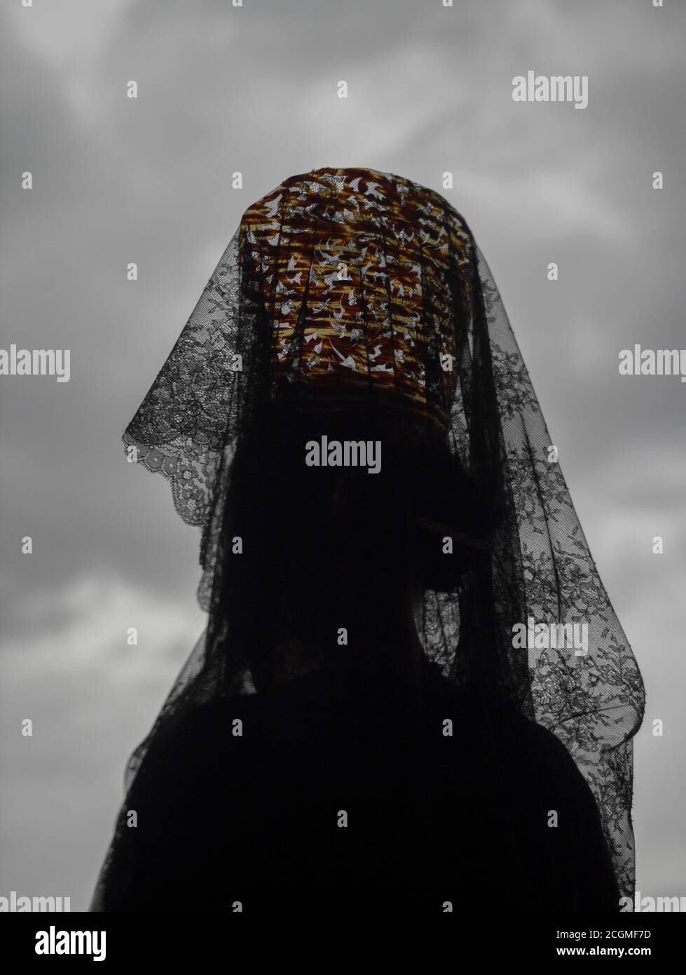 Woman wearing a headdress of black lace Stock Photo