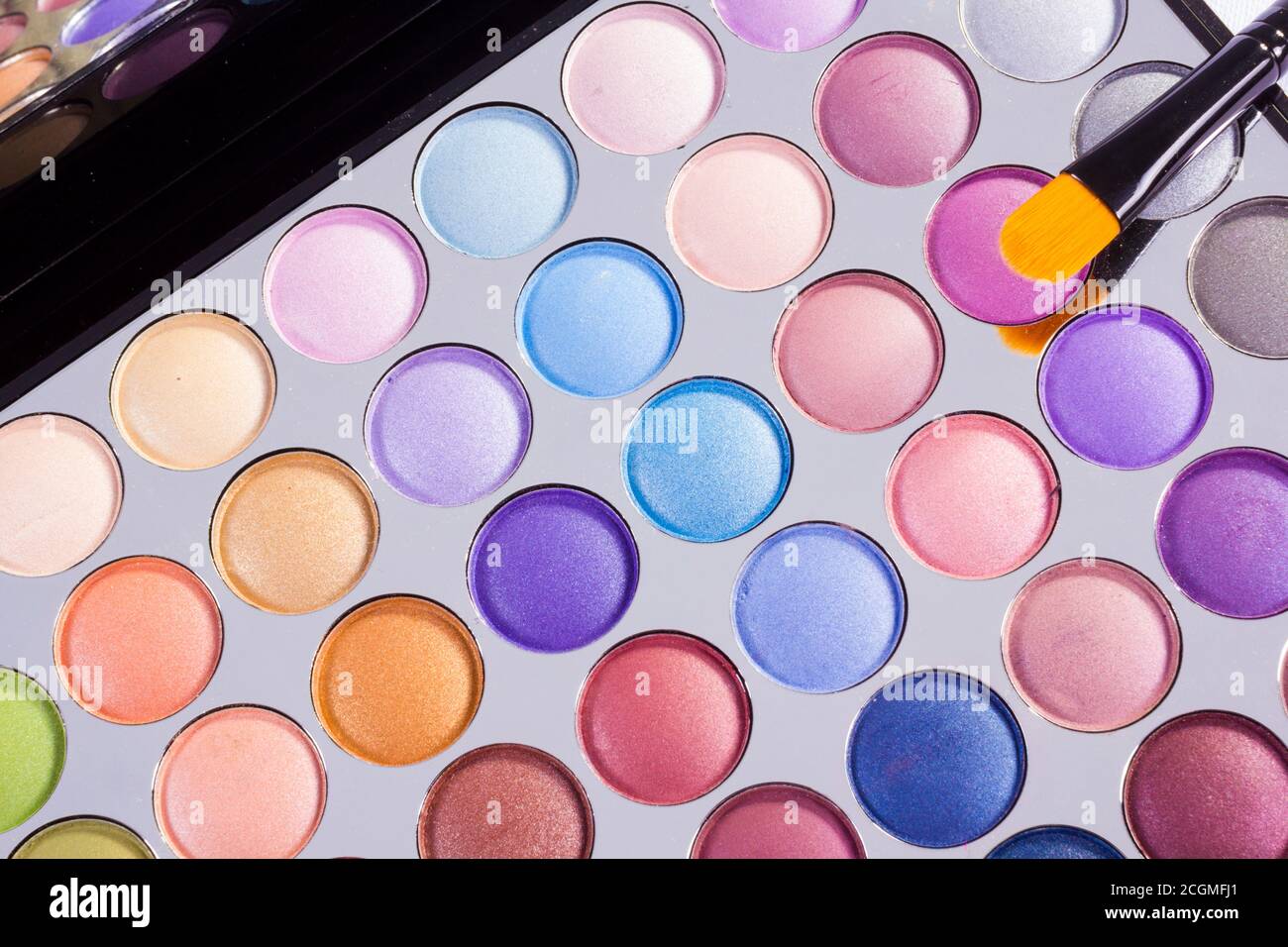 Open compact of colourful eye shadow Stock Photo