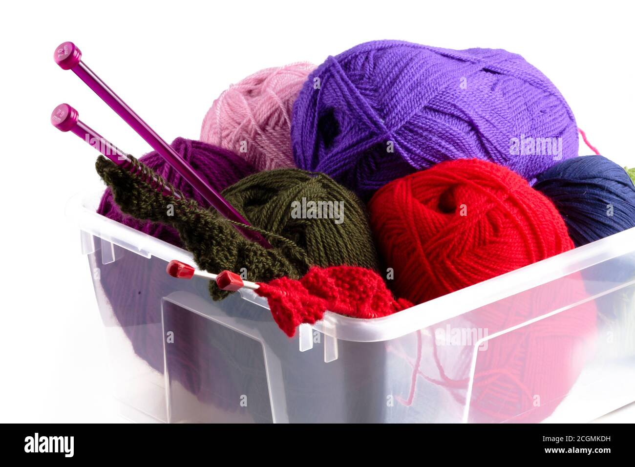 Plastic box with knitting needles and wool Stock Photo
