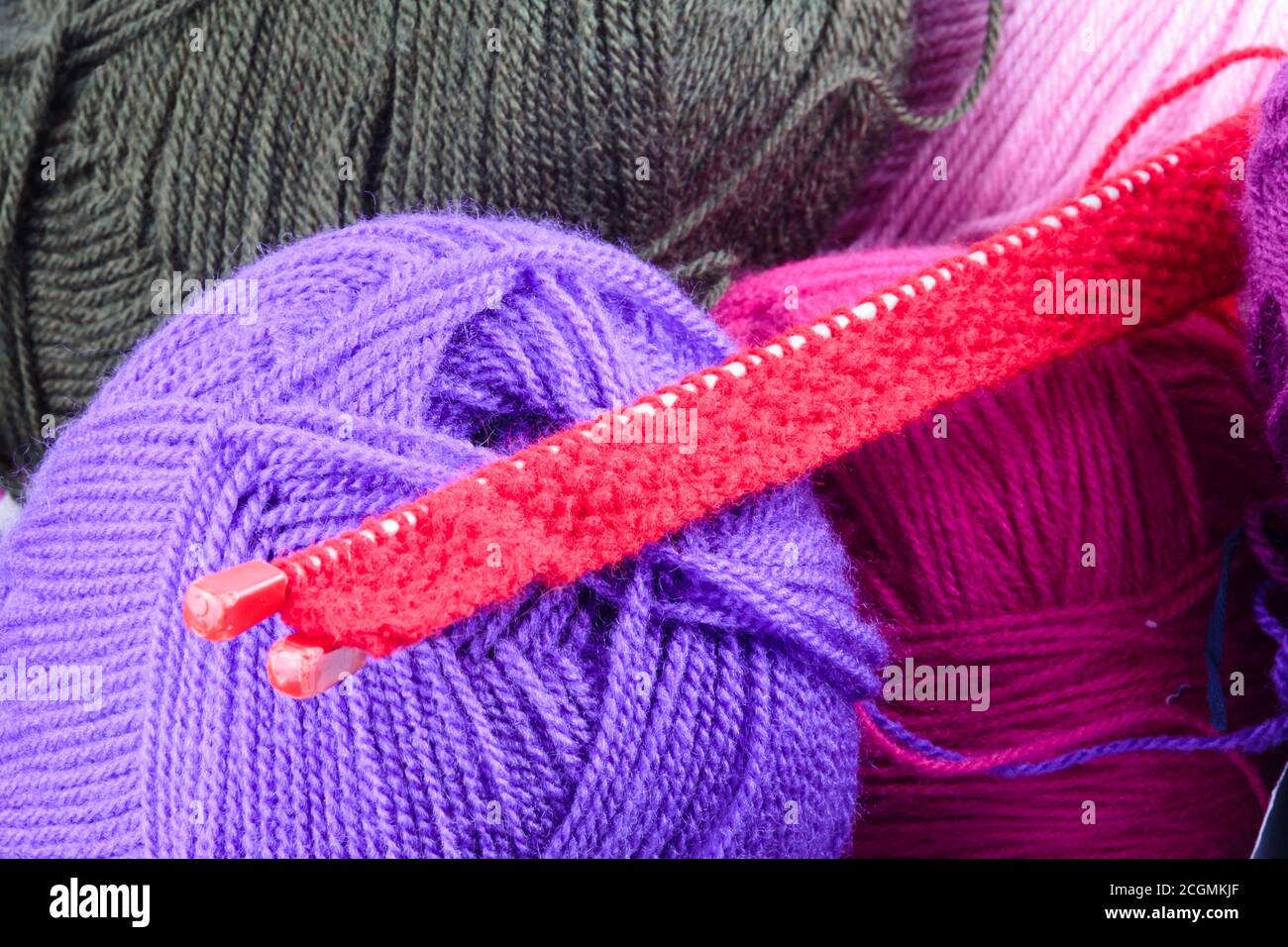 Background texture of balls of wool and knitting Stock Photo