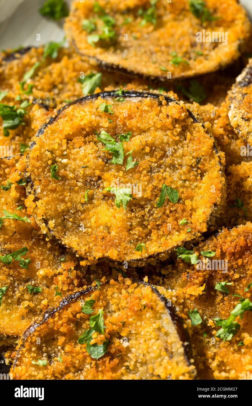 Homemade Breaded Baked Eggplant with Parmesan and Garlic Stock Photo