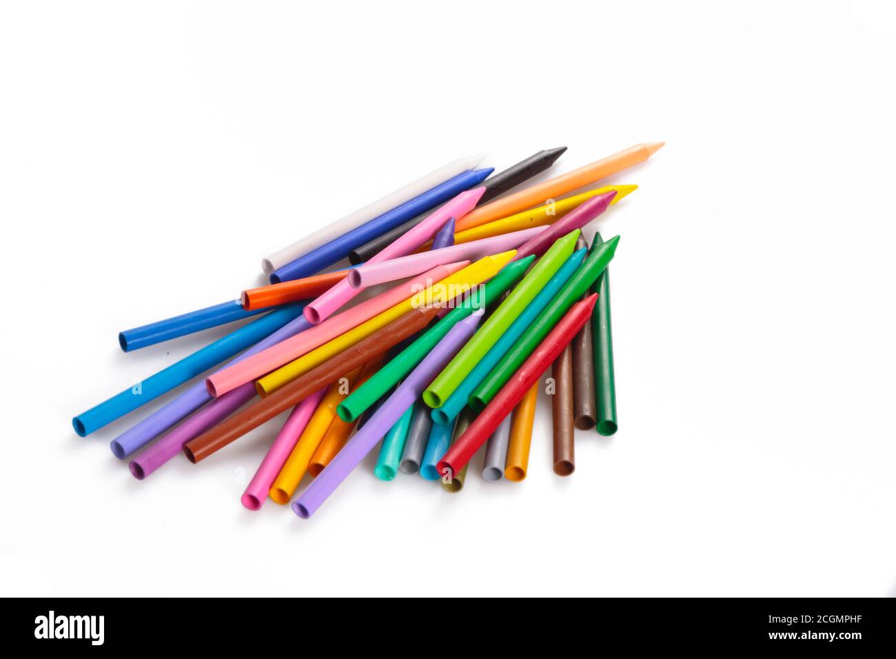 Random heap of rainbow colored wax pencil crayons Stock Photo Alamy