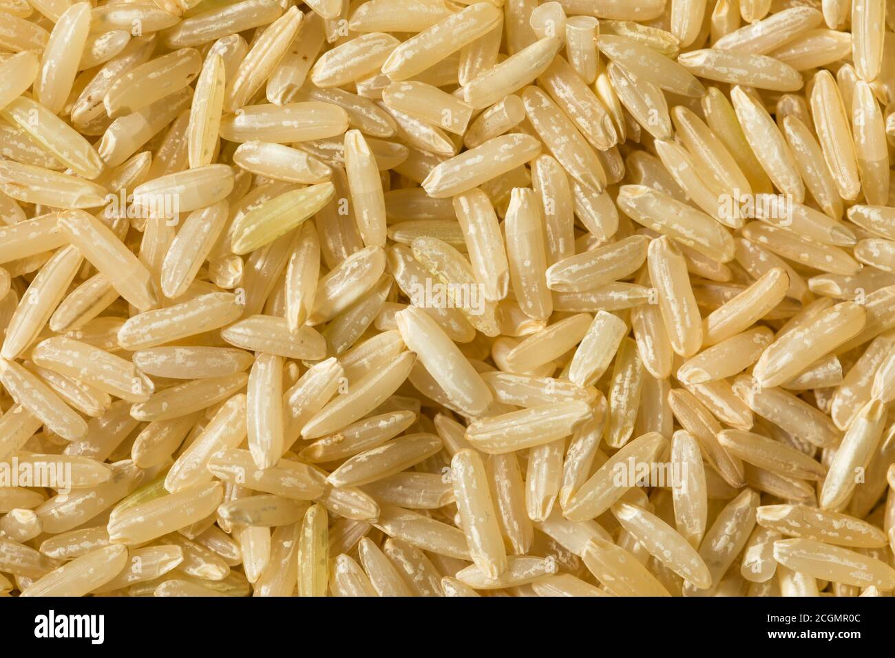 Undercooked Brown Rice Raw Dry Organic Brown Rice Ready to Cook Stock Photo - Alamy