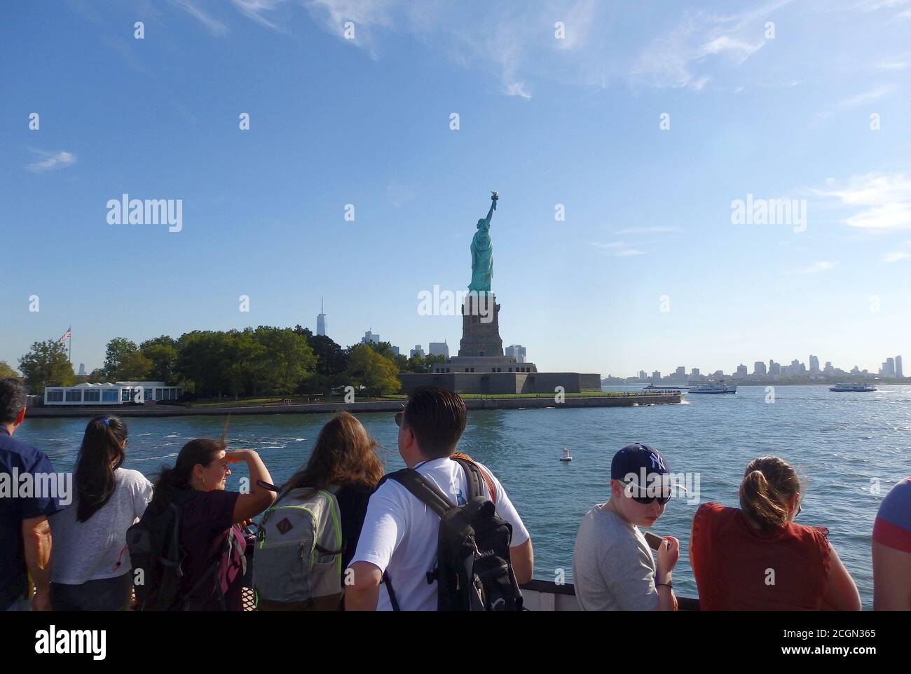 The Statue of Liberty National Monument from a boat in New York Harbor, New York City, United States Stock Photo