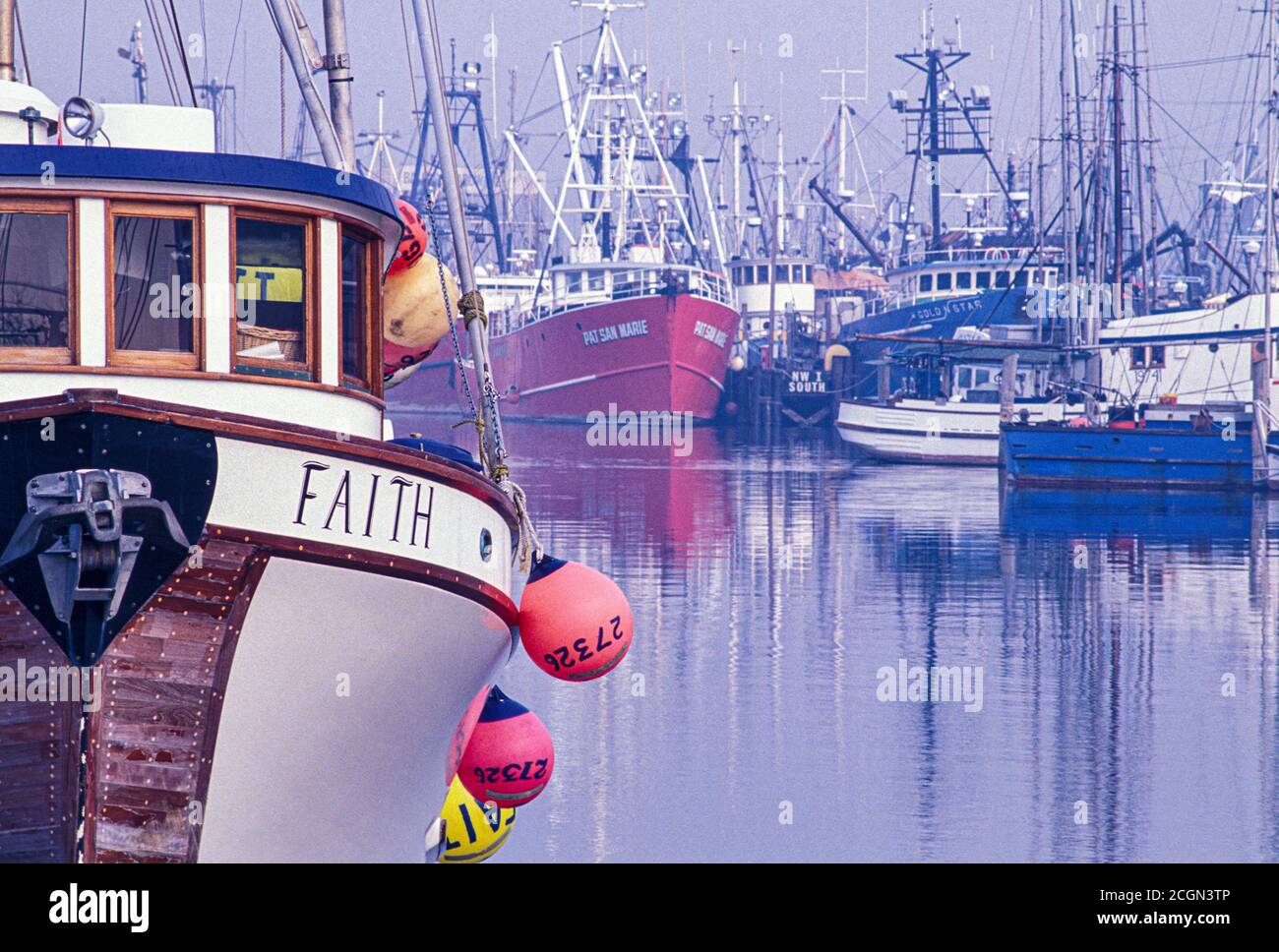 Fishing boat named Faith in fog at Fisherman’s Terminal, Port of Seattle, Washington USA Stock Photo