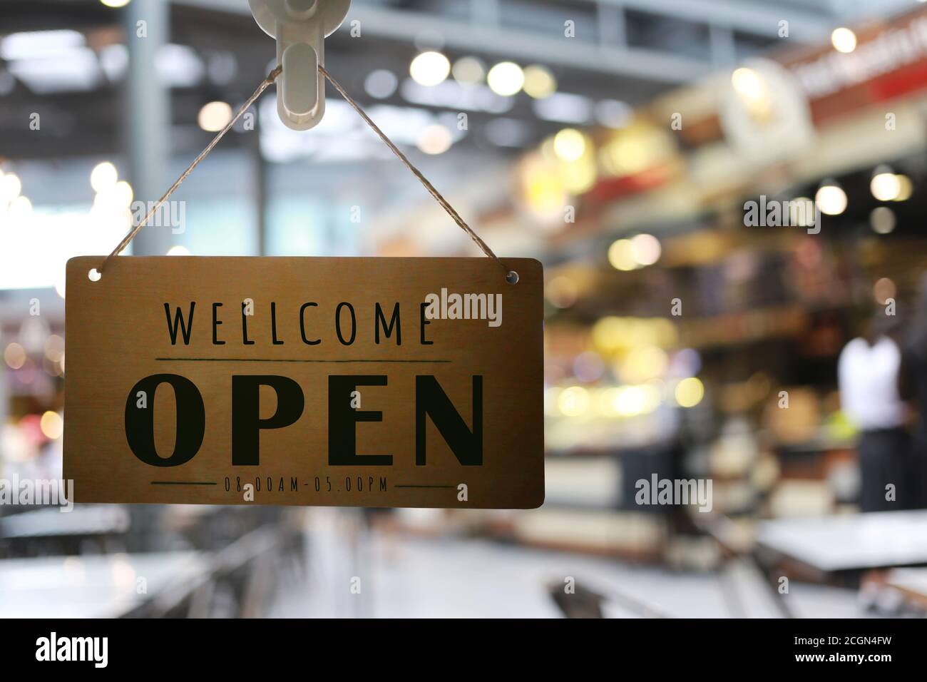 Shop open of storefront sign,restaurant shows the opening status. Stock Photo