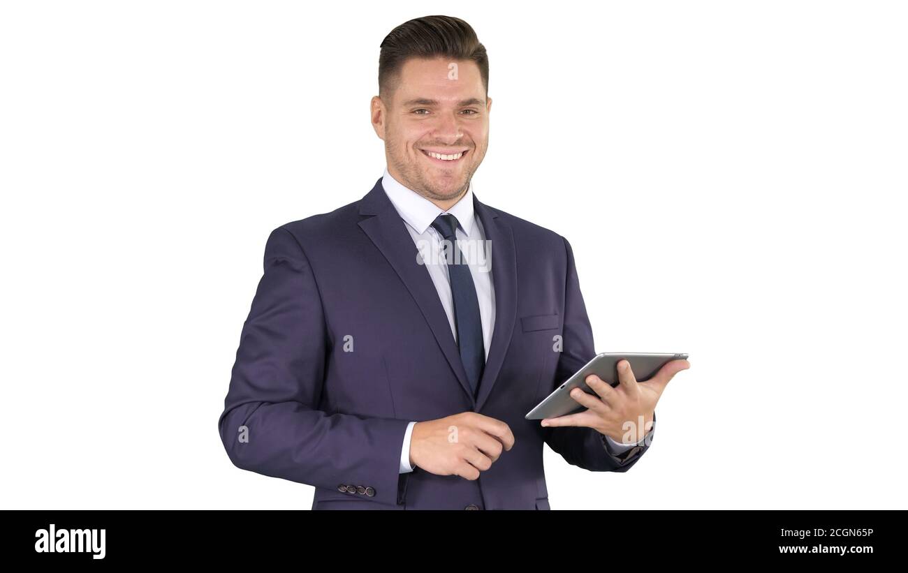 Expressive young businessman with tablet presenting something sw Stock Photo