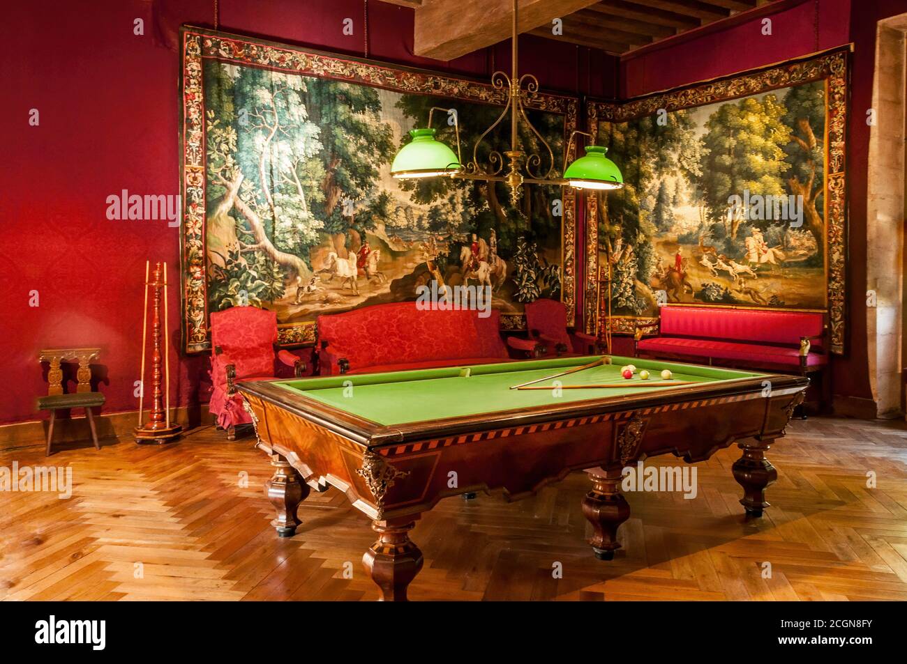 Azay-le-Rideau, France - October 30, 2013: The billiard room hung with Beauvais tapestries, woven in the 18th century, depicting hunting scenes. Azay Stock Photo
