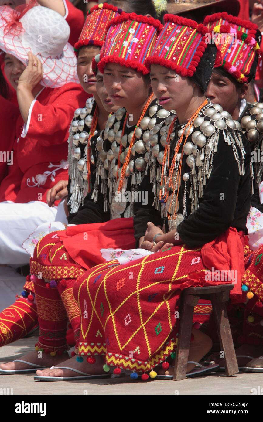 Jingpo (Kachin) women in traditional costume, at a village dance competition, Husa, Dehong Prefecture, southwest Yunnan, China 7th March 2008 Stock Photo