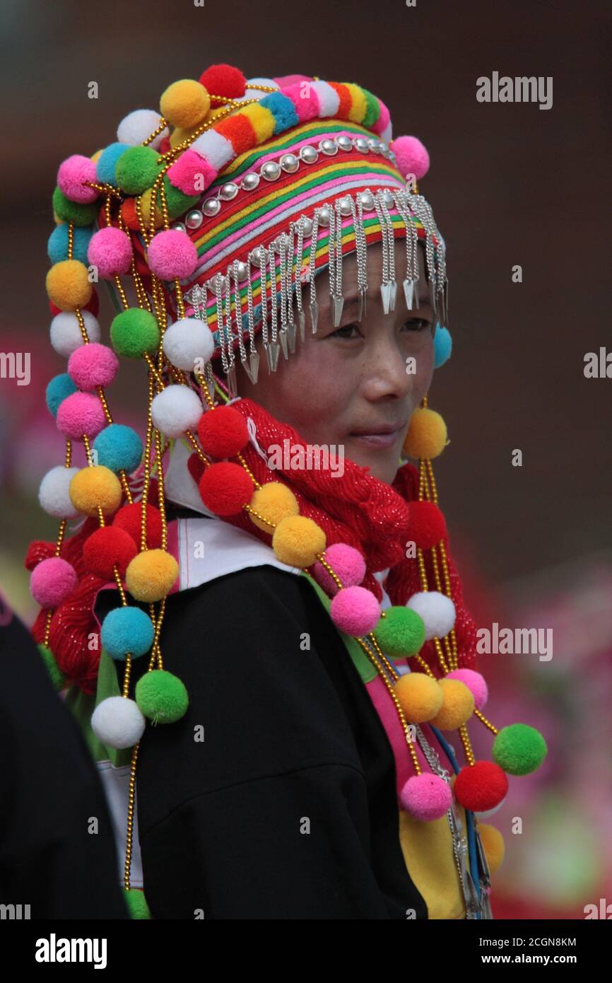 Portrait of a woman in Lisu costume at village dance competition, Husa, Dehong Prefecture, southwest Yunnan, China 7th March 2008 Stock Photo