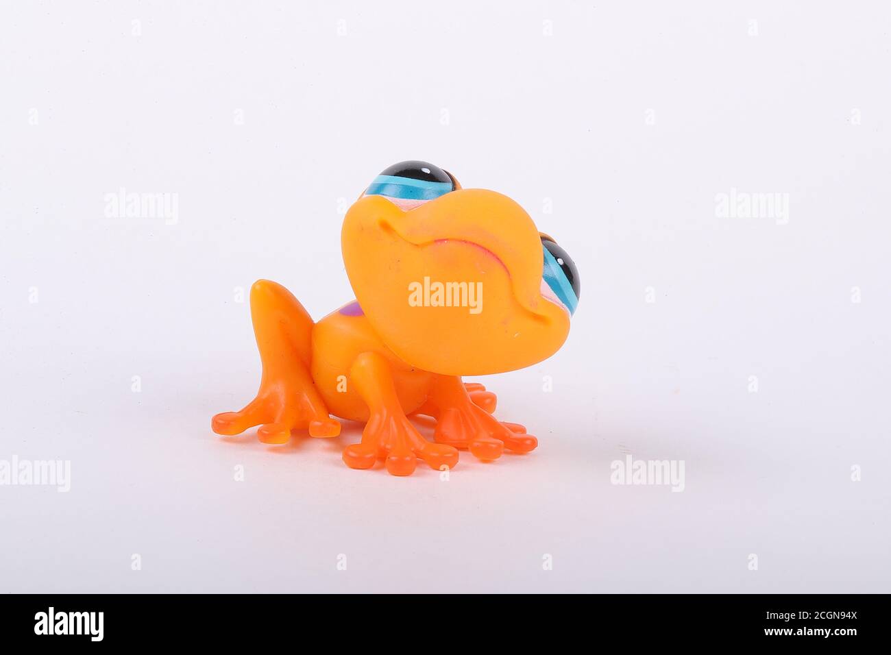 Littlest Pet Shops macro of orange Frog on White Photo credit Luke