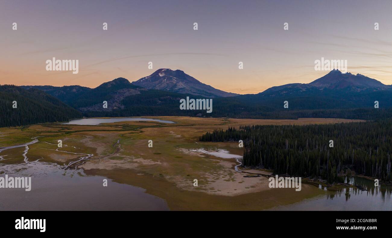 Broken Top and Sisters Mountains near Bend Oregon with dried up lake