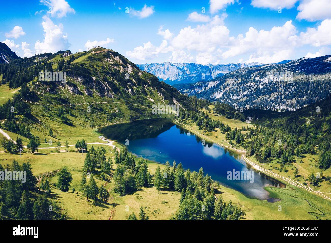 Tauplitz Alm. Lake Großsee and Lawinenstein peak mountain in Styria during summer. Stock Photo