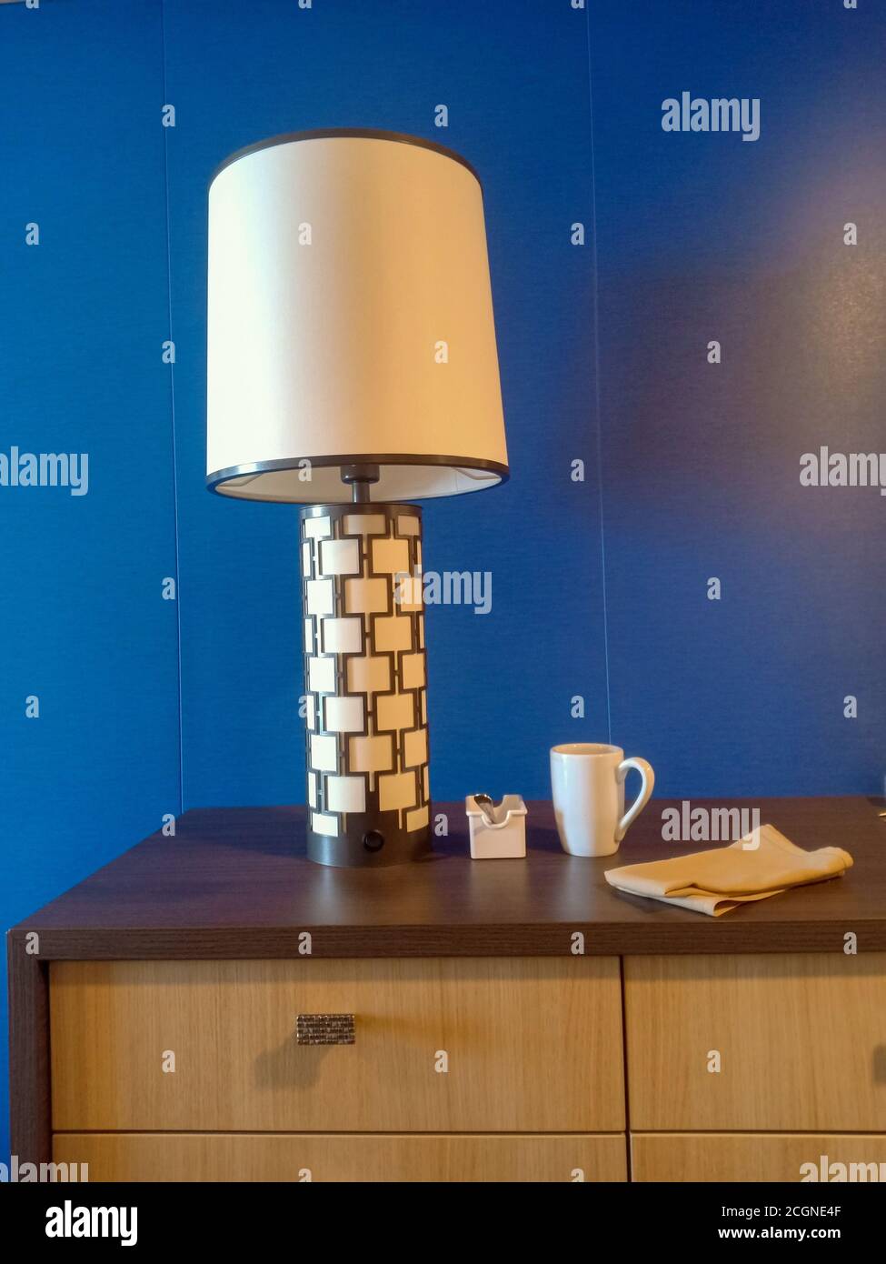table light coffee cup and a napkin on a table Stock Photo