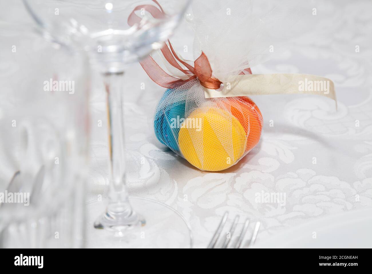 Colored macarons on wedding table with ribbon Stock Photo