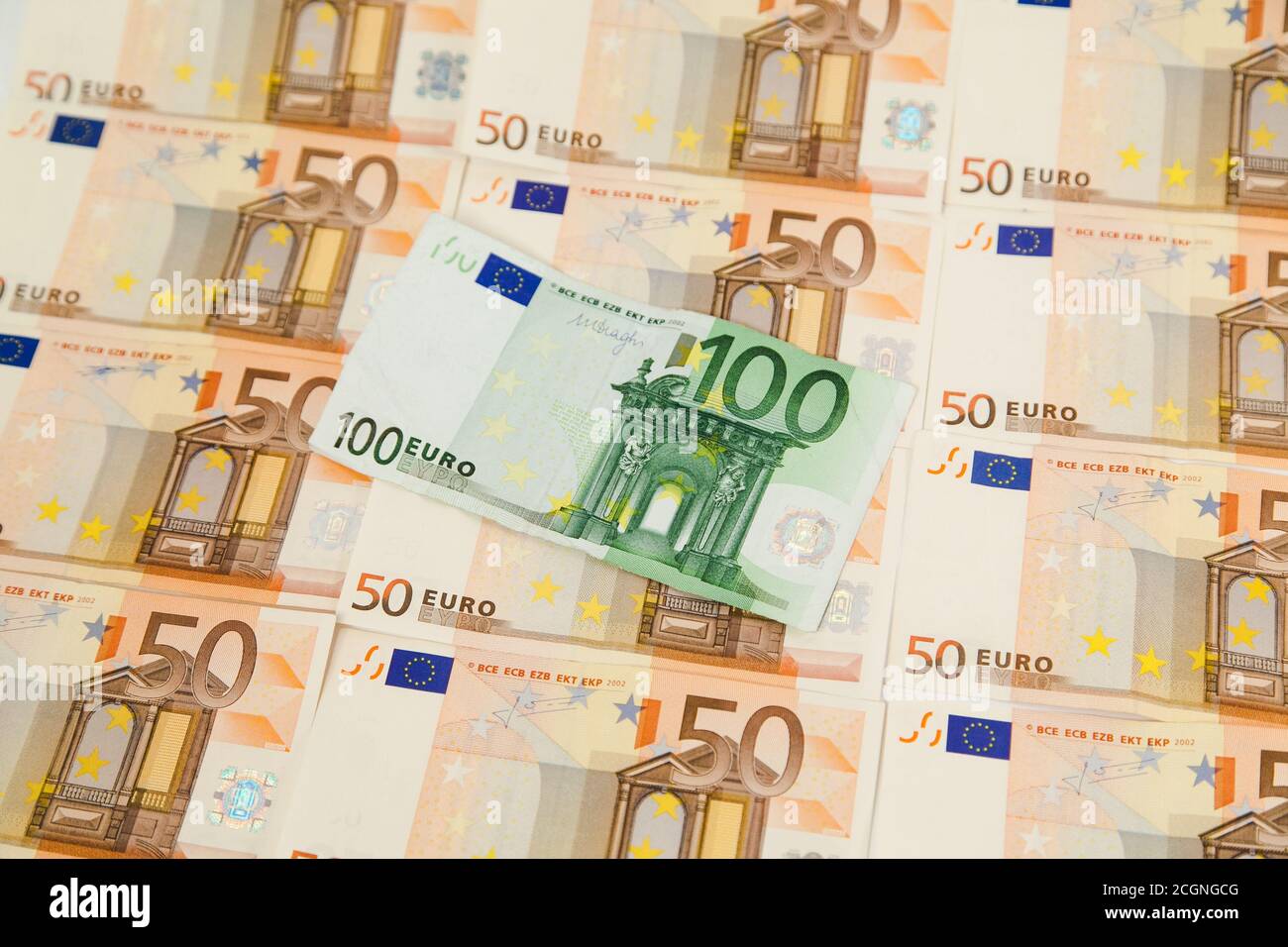 One hundred euro banknote on money background Stock Photo - Alamy