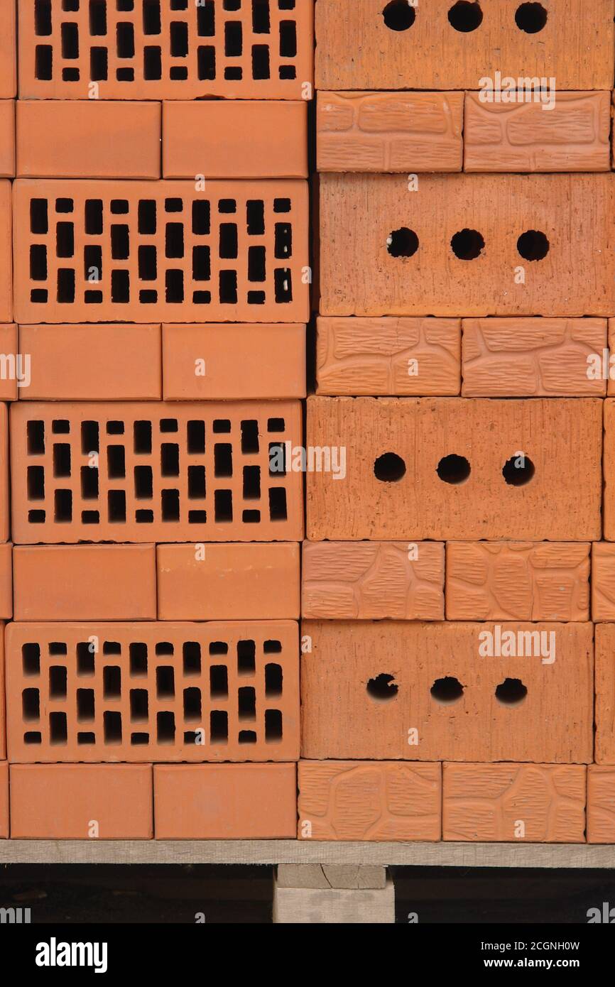 Clay brown bricks on construction market. Stock Photo