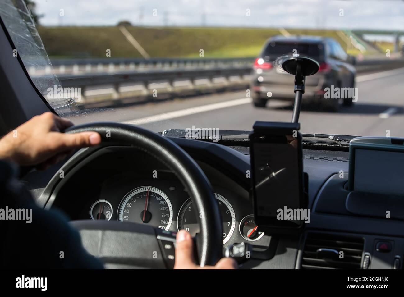 Drivers hand holding steering wheel hi-res stock photography and images ...