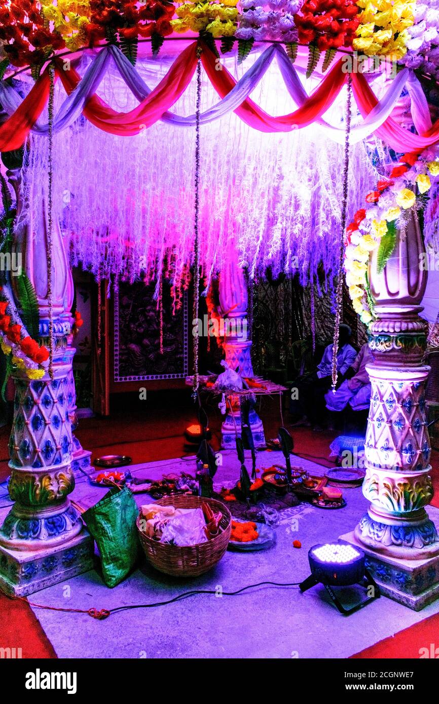 Bengali hindu wedding stage decoration with lighting and props Stock Photo