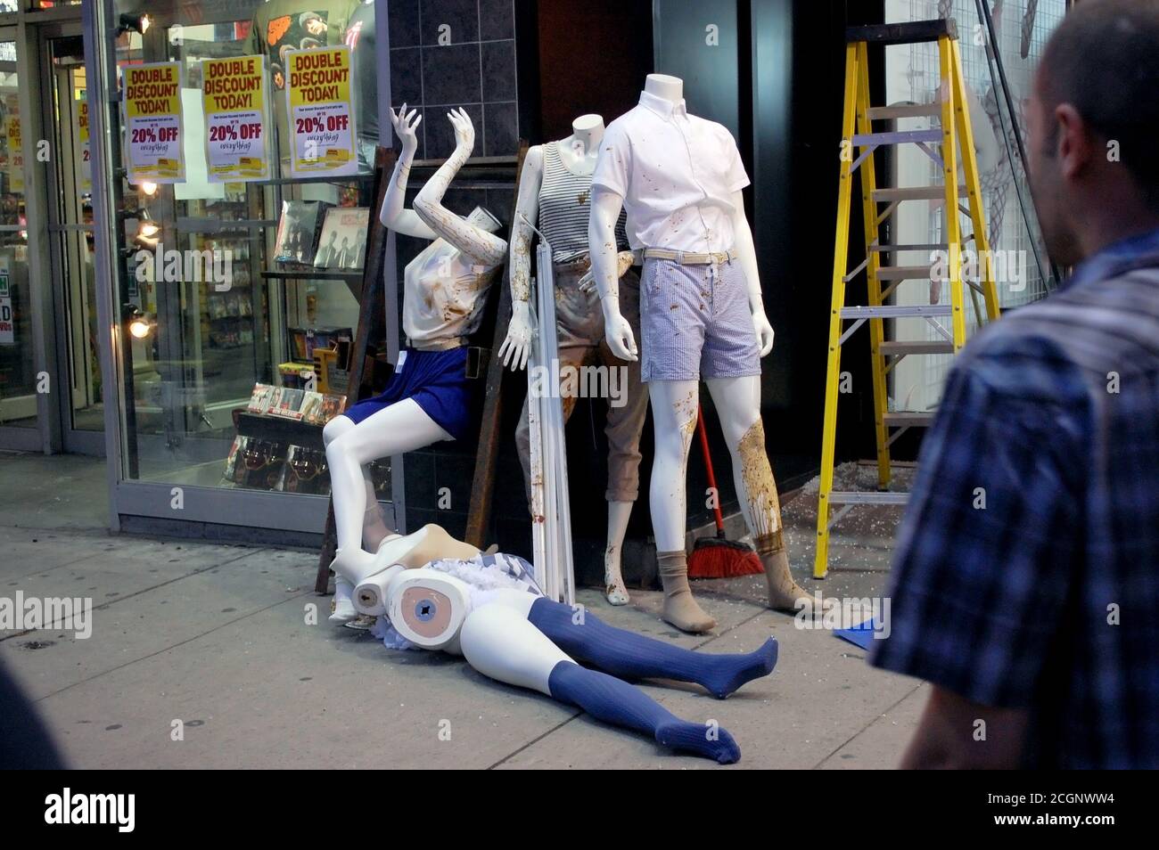 Damaged mannequins outside American Apparel store in downtown Toronto