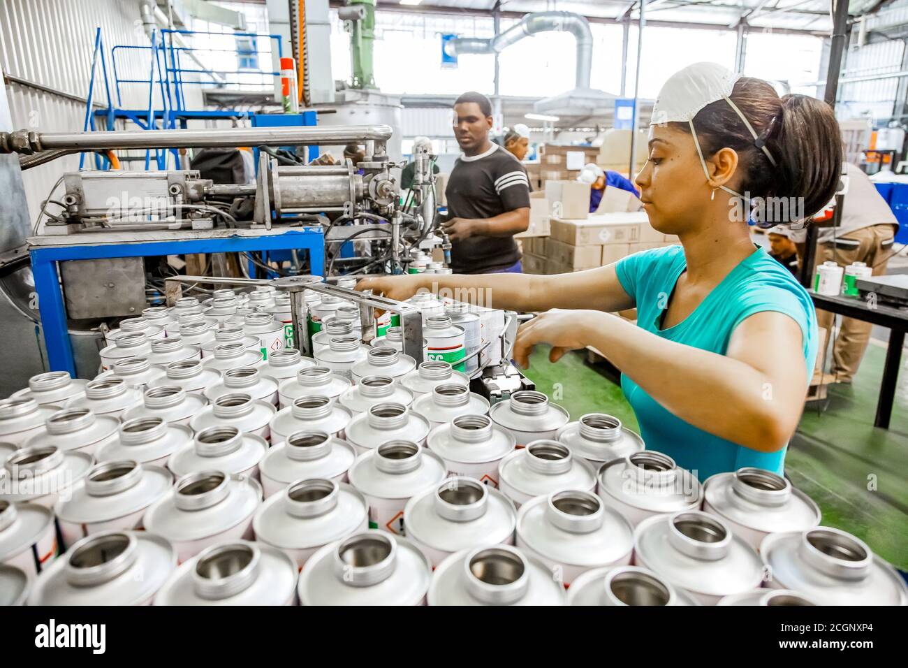 Johannesburg, South Africa - October 19, 2012: Diverse people working on an  assembly line in a glue factory Stock Photo - Alamy