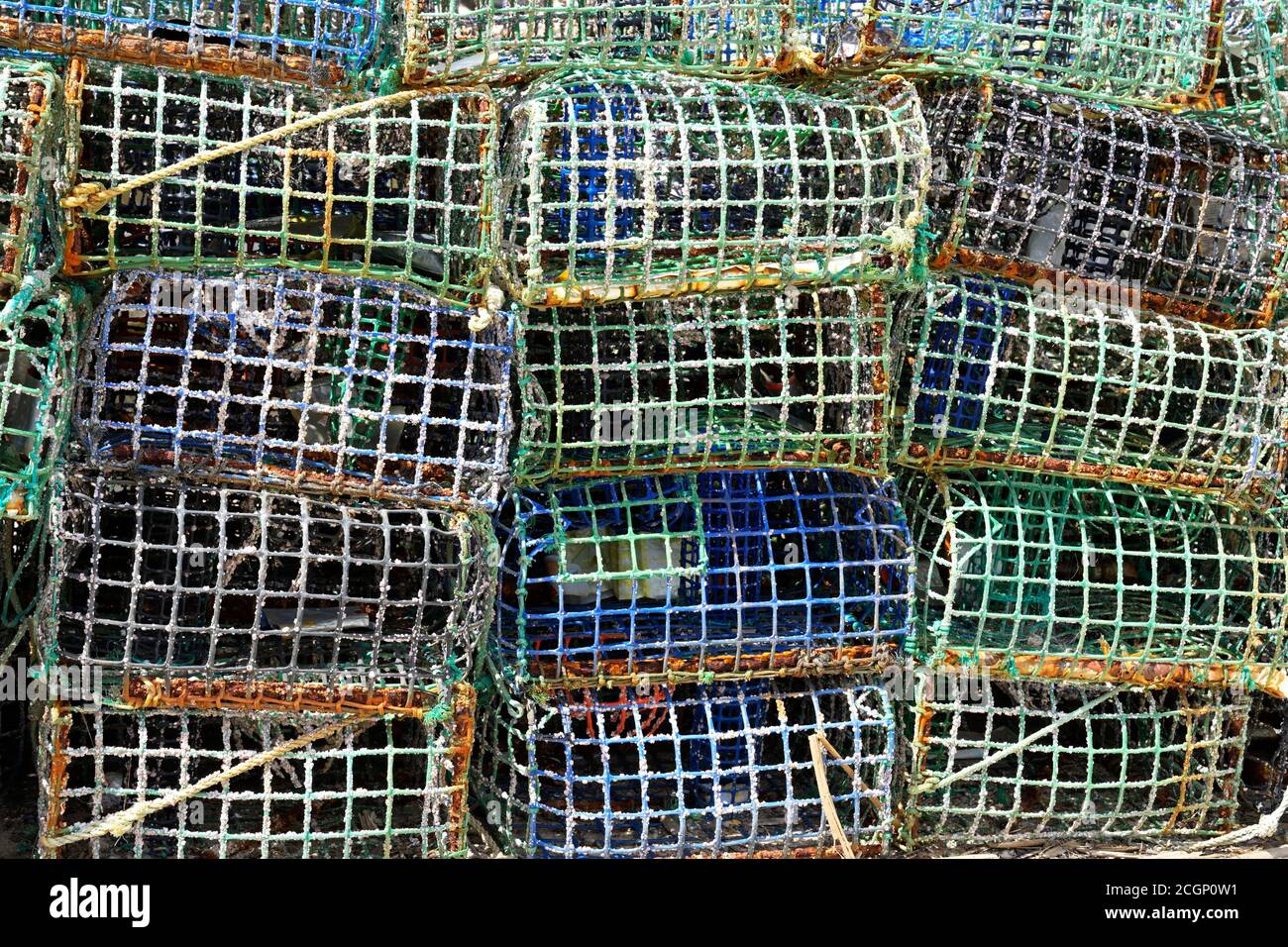 Basket fish traps for crab and lobster fishing in the Atlantic Ocean, Alvor fishing harbour, Portimao municipality, Algarve, Portugal Stock Photo