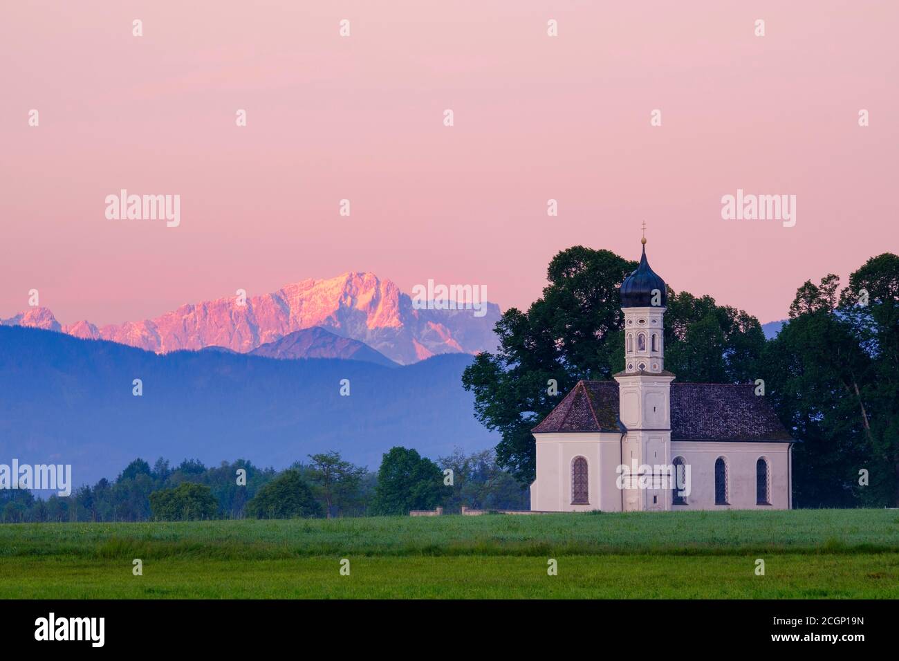 Church St. Andrae near Etting in the morning light, in the back the Zugspitze, near Polling, Pfaffenwinkel, Alpine foreland, Upper Bavaria, Bavaria Stock Photo
