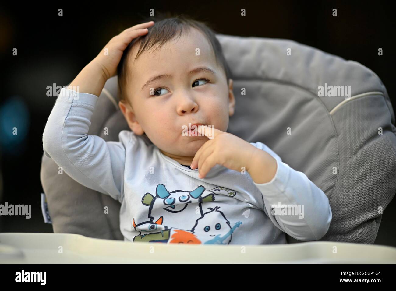 Toddler, boy, 14 months, multiethnic, thoughtful, Blaubeuren, Baden-Wuerttemberg, Germany Stock Photo