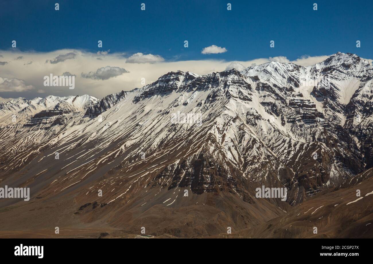 Snow clad Himalayan mountain range in Spiti Valley, Himachal Pradesh, India Stock Photo