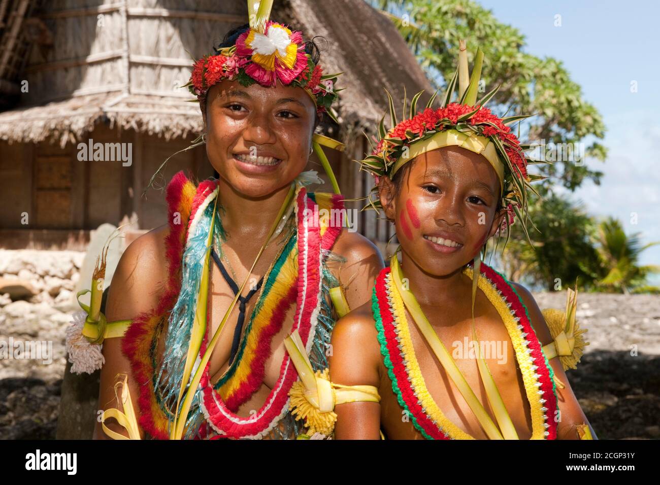 Young people with traditional flower arrangements, Yap Island, Micronesia Stock Photo