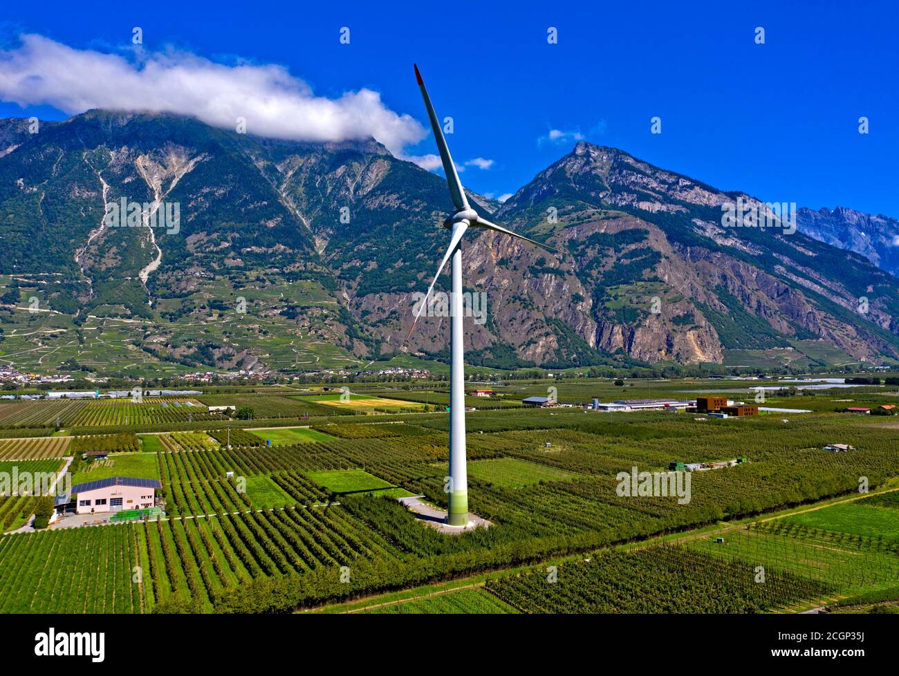 Largest wind turbine in Switzerland amidst fruit orchards in the Rhone  Valley, Charrat, Valais, Switzerland Stock Photo - Alamy