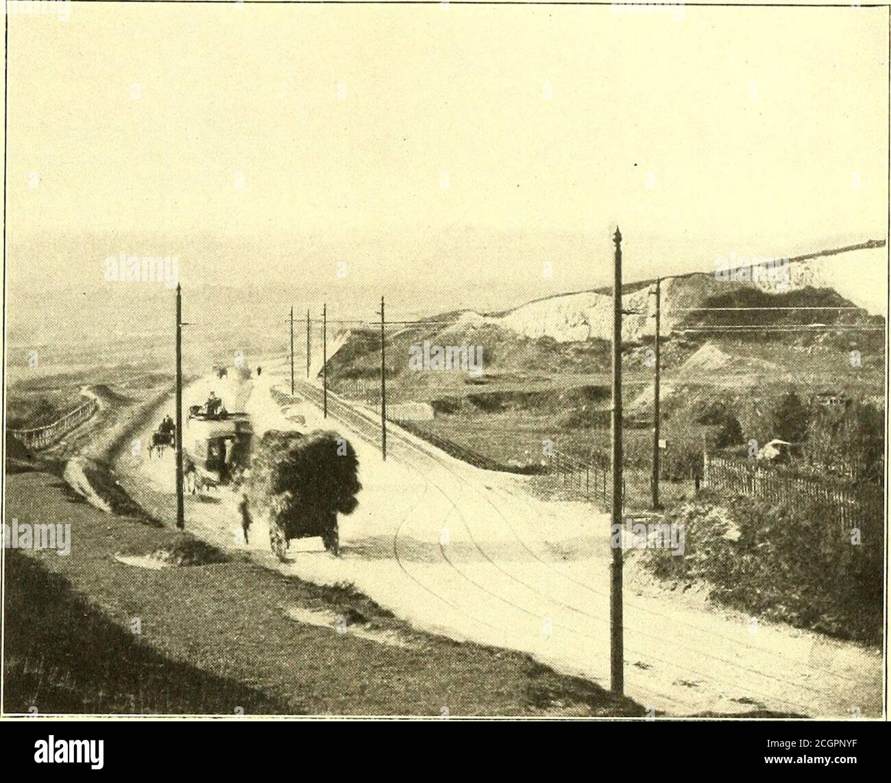 . The Street railway journal . cts of morethan ordinary interest. On leaving Cosham agood view is obtained of Portsmouth with itsancient castle, where, during the French Revo-lution, nearly 8000 prisoners were confined;as also were the Dutch prisoners taken at thebattle of Camperdown in 1797. From the top of Portsdown Hill, nearly 400ft. high, a magnificent view of both sea andland is obtained. The dockyard, the town hall and the parishchurch of St. Marys stand out in bold relief. Beyond Ports-mouth is seen the Isle of Wight with all its beauties of hillsand dales, downs and cliffs. Continuing Stock Photo