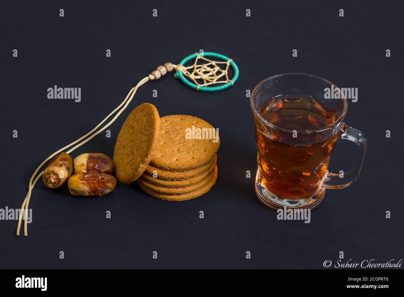 Black tea and Biscuit with Dates fruit Stock Photo Alamy