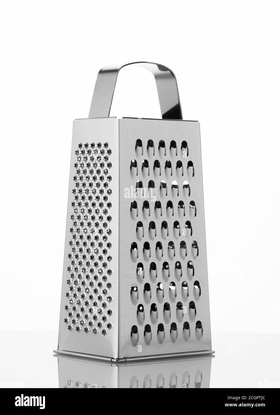 Shiny Stainless Steel Grater Isolated on white background. Stock Photo