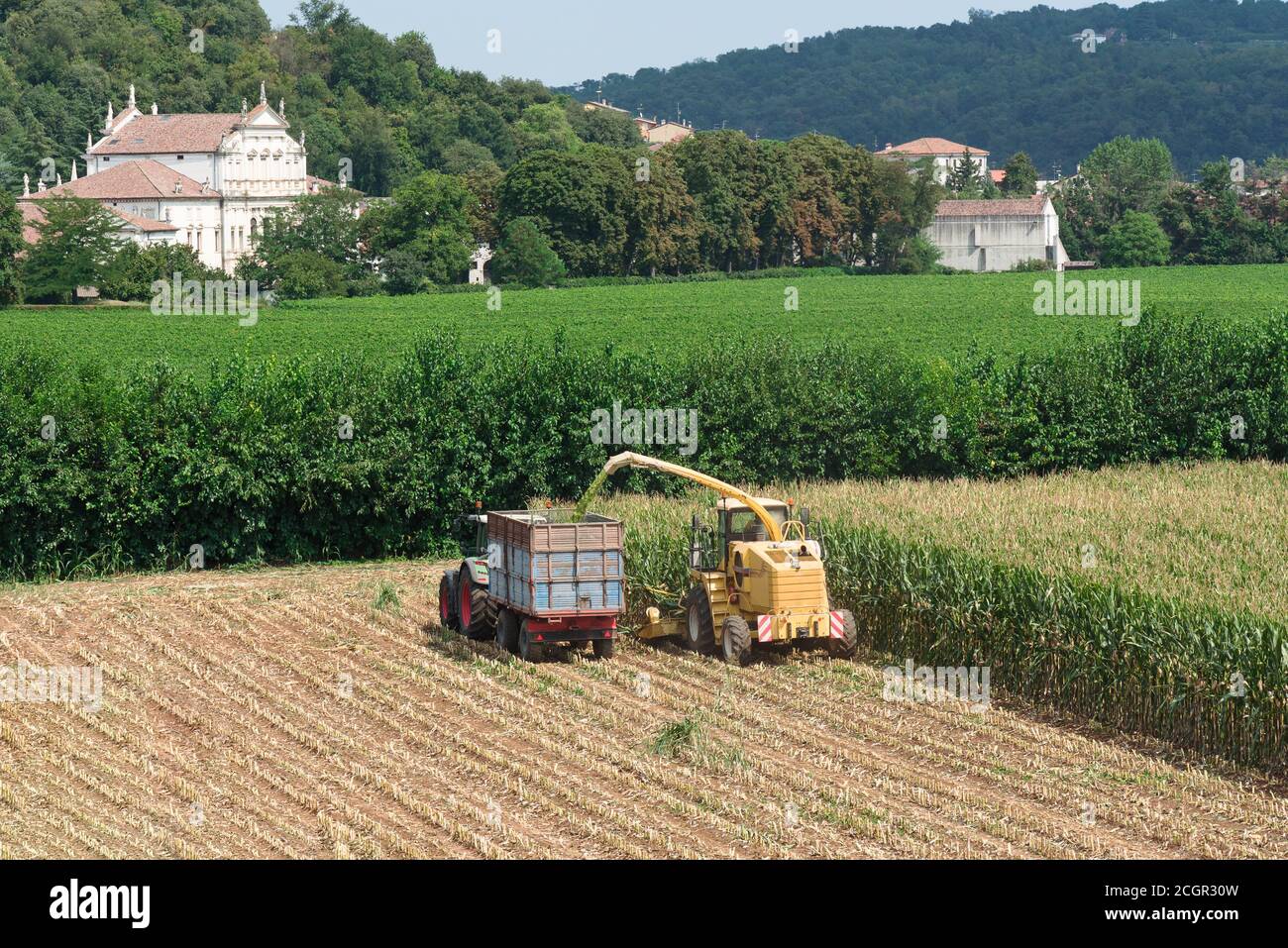 Harvesting work with tractor hi-res stock photography and images - Alamy