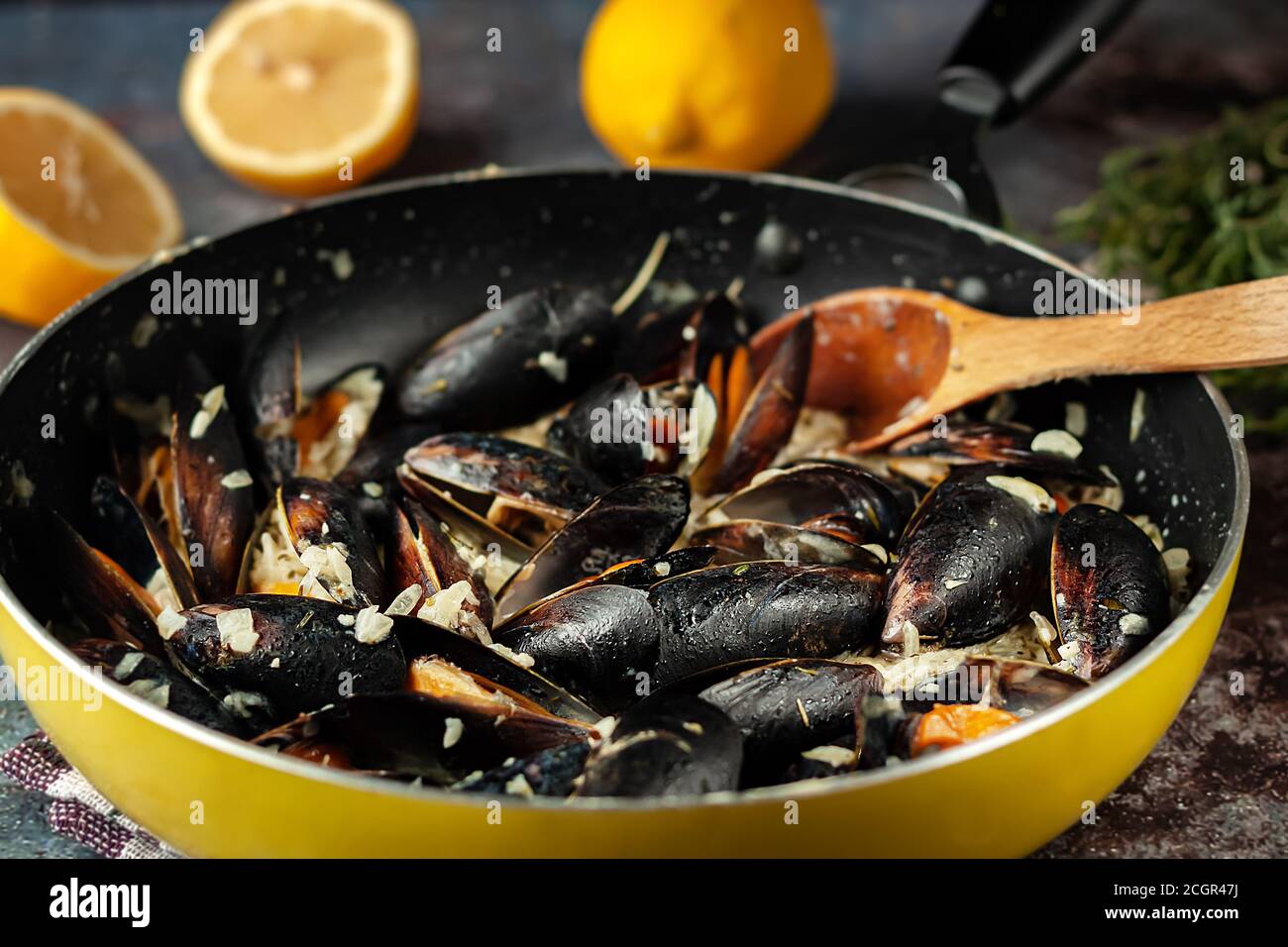 Moules Marinieres - Mussels cooked with white wine sauce. Stock Photo
