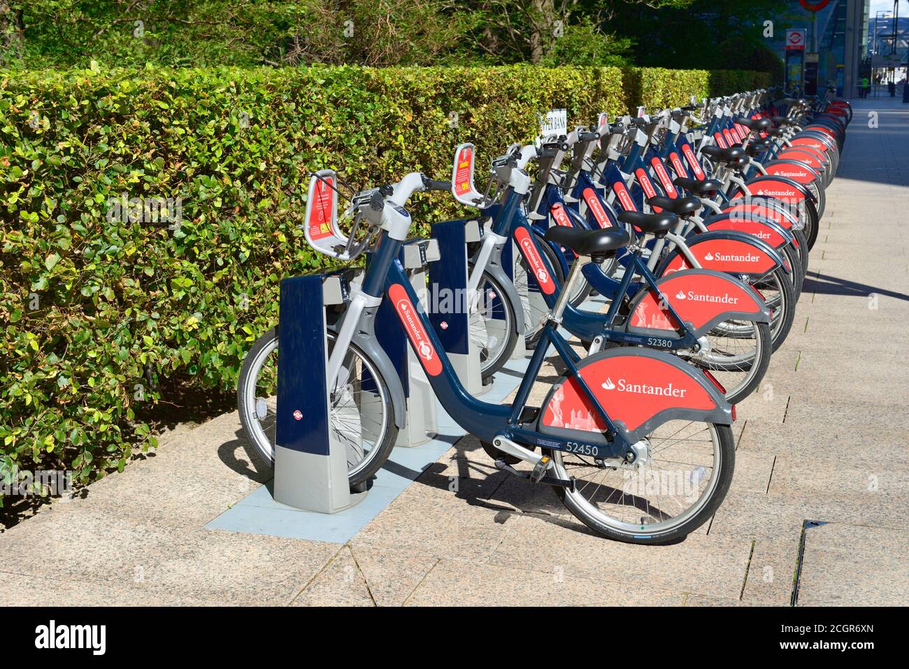 Transport for London and Santander bicycle hire docking station, Upper Bank Street, Canary Wharf, East London, United Kingdom Stock Photo
