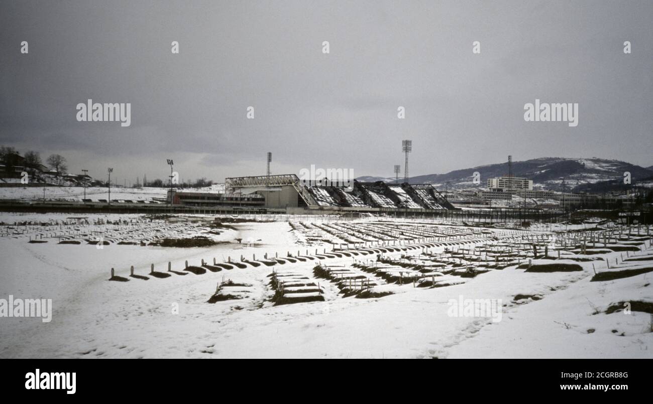 24th February 1994 During the Siege of Sarajevo: recent graves in a corner of the Mezarje Stadium cemetery, next to the Koševo Stadium. Stock Photo