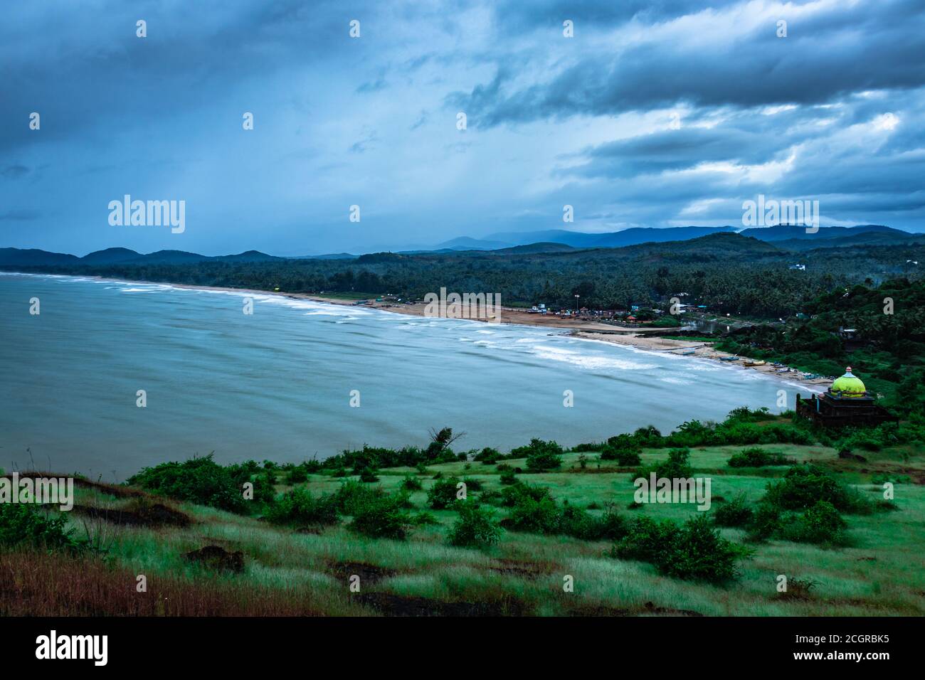 mountain top view of sea shore with clouded sky at evening image is taken at gokarna karnataka india. Stock Photo