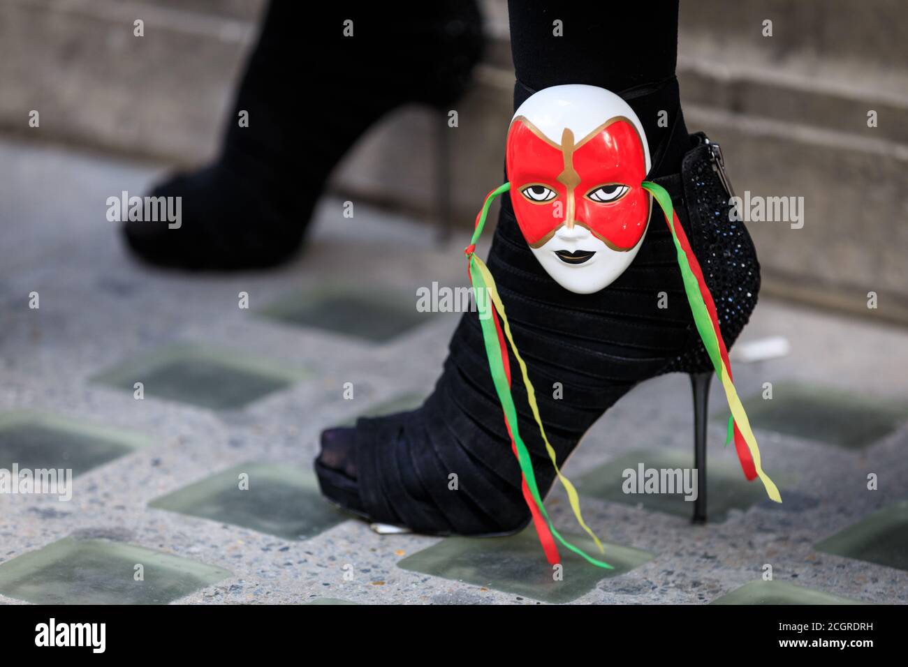 Mayfair, London, UK,  22 Jun 2019. Stiletto, shoe detail with decorative mask, flashmob fashion show for designer Pierre Garroudi Stock Photo