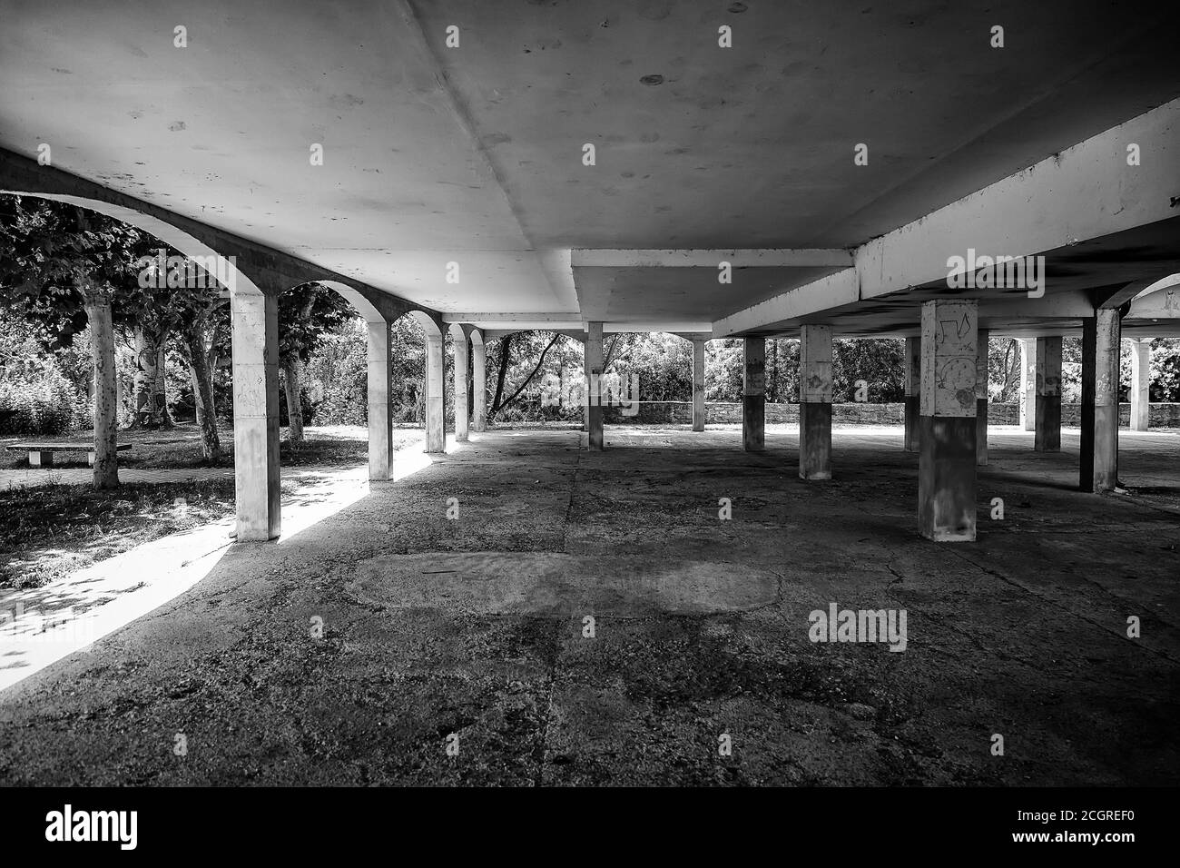 Old abandoned premises with columns, detail of ruin and abandonment, old factory Stock Photo