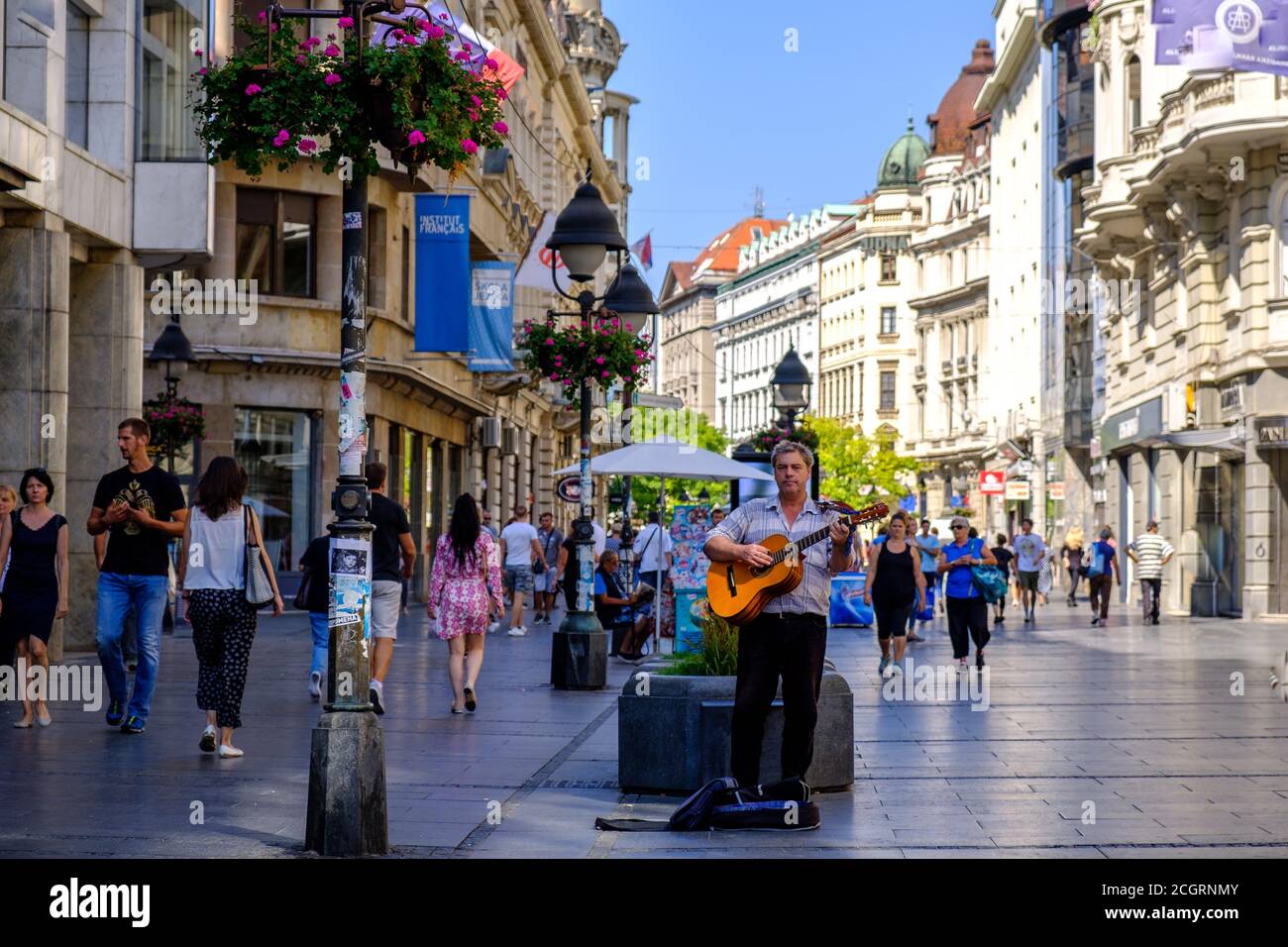 Belgrade / Serbia - September 16, 2018: Street guitarist playing in Knez Mihailova Street, the main pedestrian and shopping zone in Belgrade, capital Stock Photo