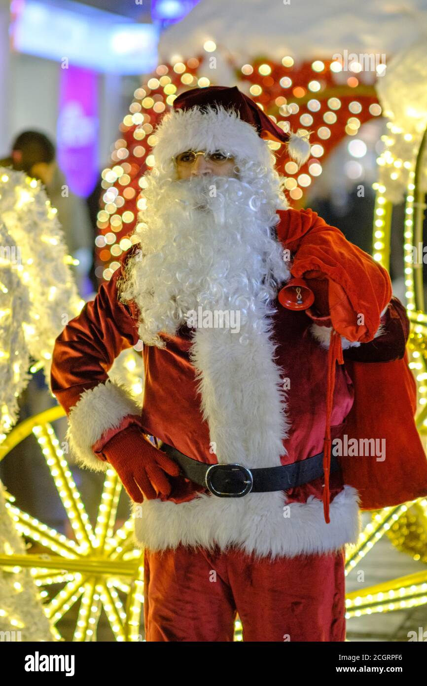 Belgrade / Serbia - December 20, 2018: Man dressed as Santa Claus in Knez Mihailova street, main pedestrian zone in Belgrade, Serbia Stock Photo